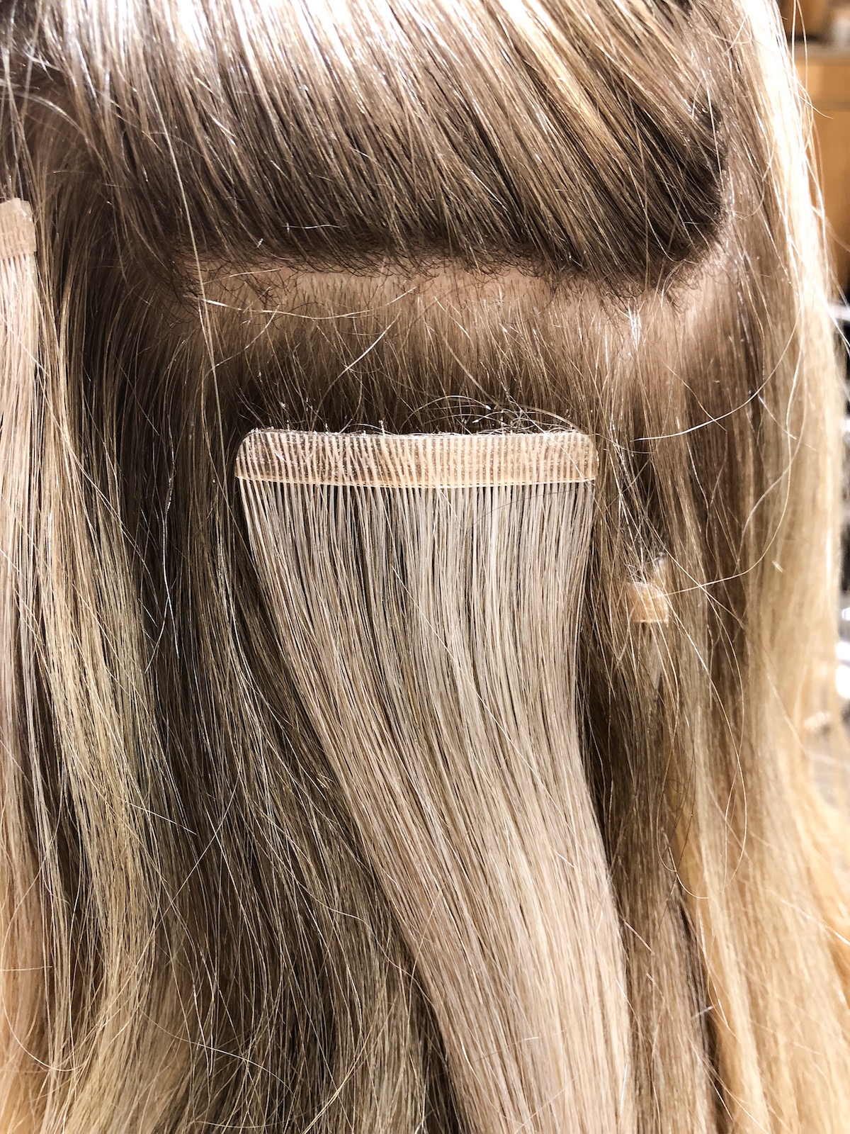 Everything You Need To Know About Tape-In Hair Extensions - Katie's Bliss